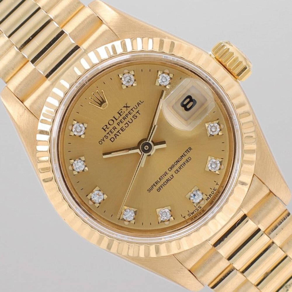 Rolex Ladies Datejust 26mm 18K Gold Champagne Diamond Dial Fluted President Band